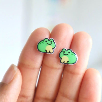 Little frog stud earrings featuring a cute frog design. These earrings are handmade with hypoallergenic titanium posts animal jewelry for kids and adults.