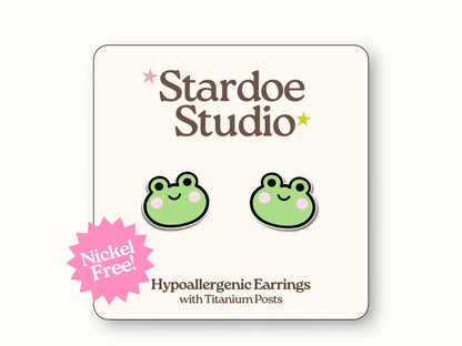 Little frog stud earrings featuring a cute blushing frog design. These earrings are handmade with hypoallergenic titanium posts animal jewelry for kids and adults.