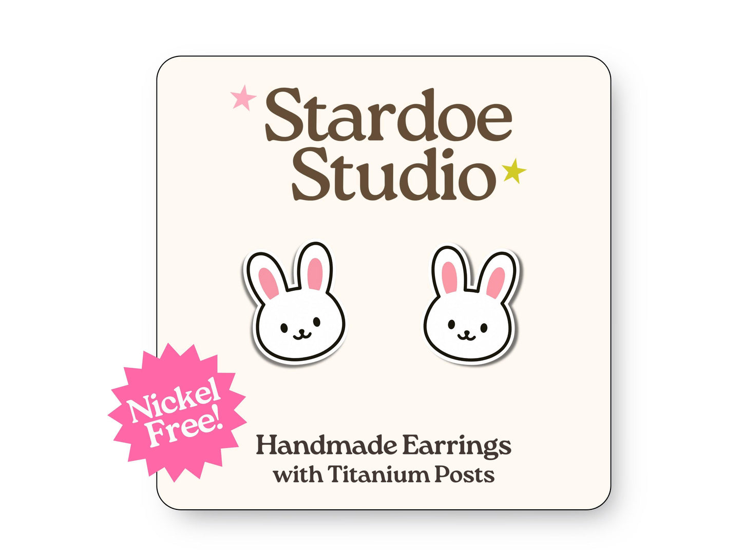 Little bunny stud earrings featuring an adorable white and pink fluffy bunny design. These earrings are hypoallergenic titanium posts cute animal jewelry for kids and adults.
