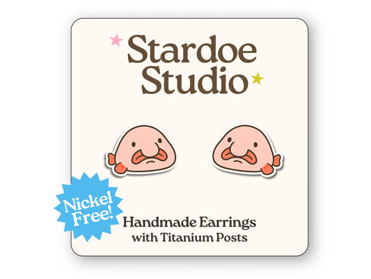 Little blobfish stud earrings featuring a funny pink deep-sea fish design. These earrings are handmade with hypoallergenic titanium posts ocean animal jewelry for kids and adults.