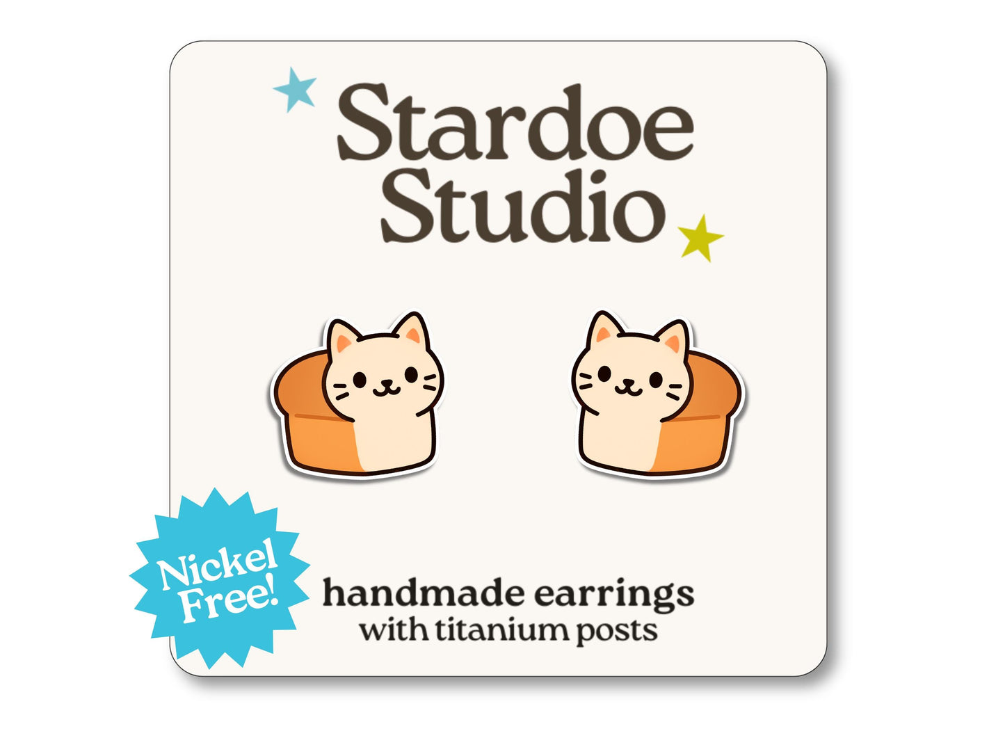A pair of cat loaf stud earrings shaped like a cute kitty in a bread loaf, with hypoallergenic titanium posts.