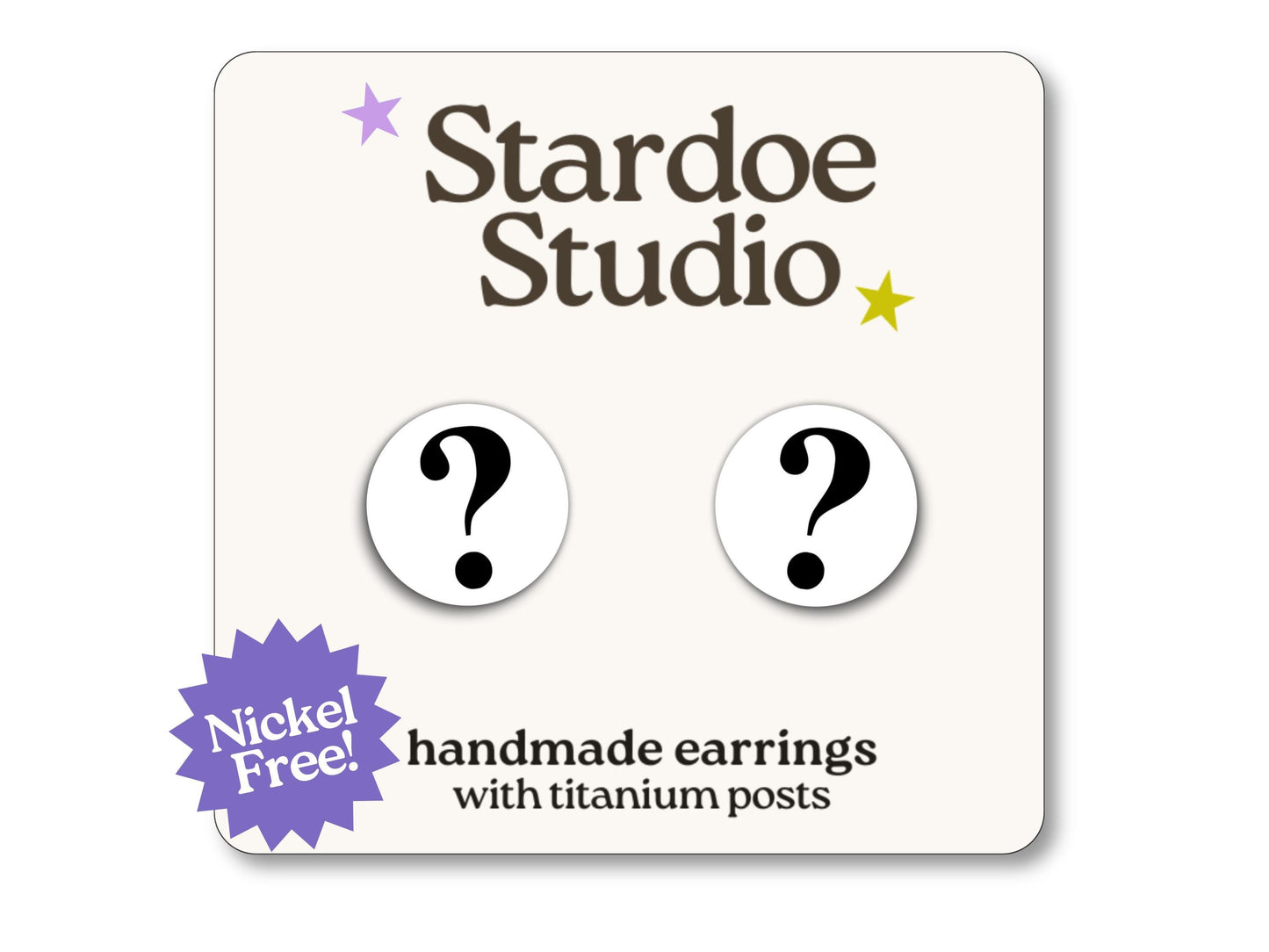 Little white question mark stud earrings featuring a bold and playful question mark design. These earrings are hypoallergenic titanium posts fun symbol jewelry for kids and adults.