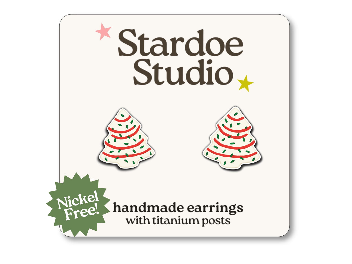 Little Christmas tree cookie stud earrings featuring a colorful tree cookie design. These earrings are hypoallergenic titanium posts fun holiday jewelry for kids and adults.